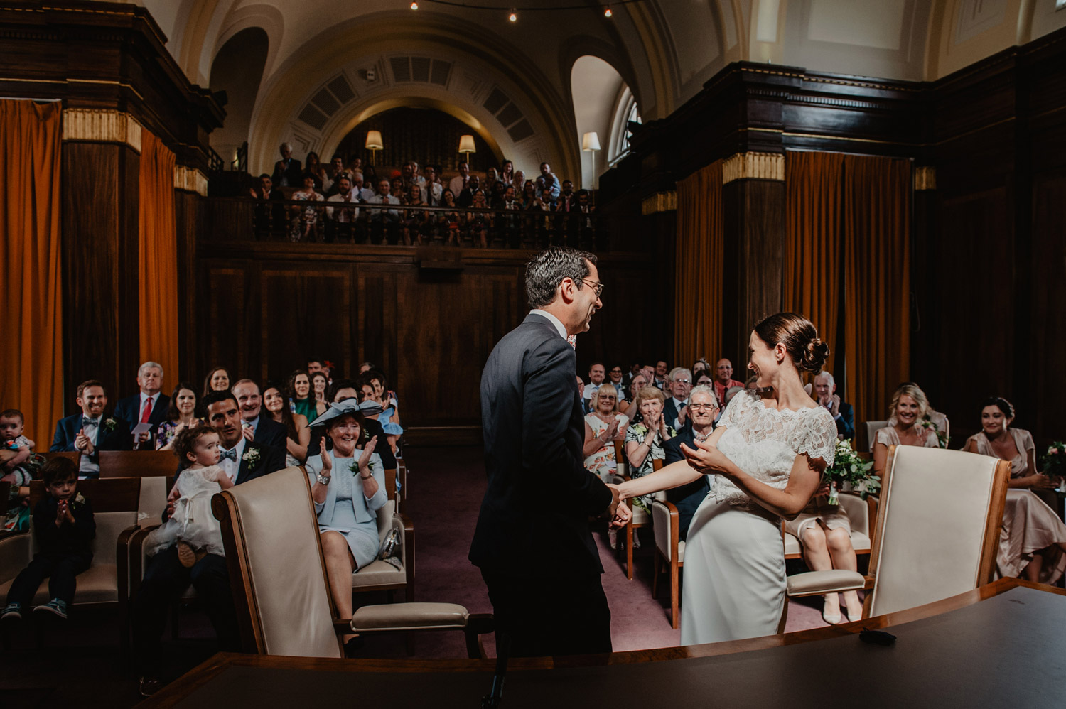 stoke newington town hall wedding bride groom first kiss