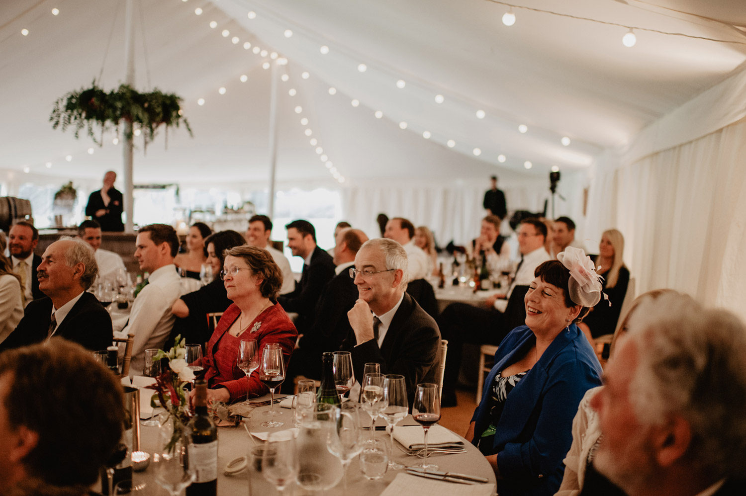 candid documentary of photos guests enjoying wedding speech