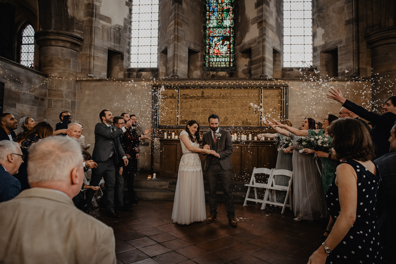 indoors confetti at winter wedding in church