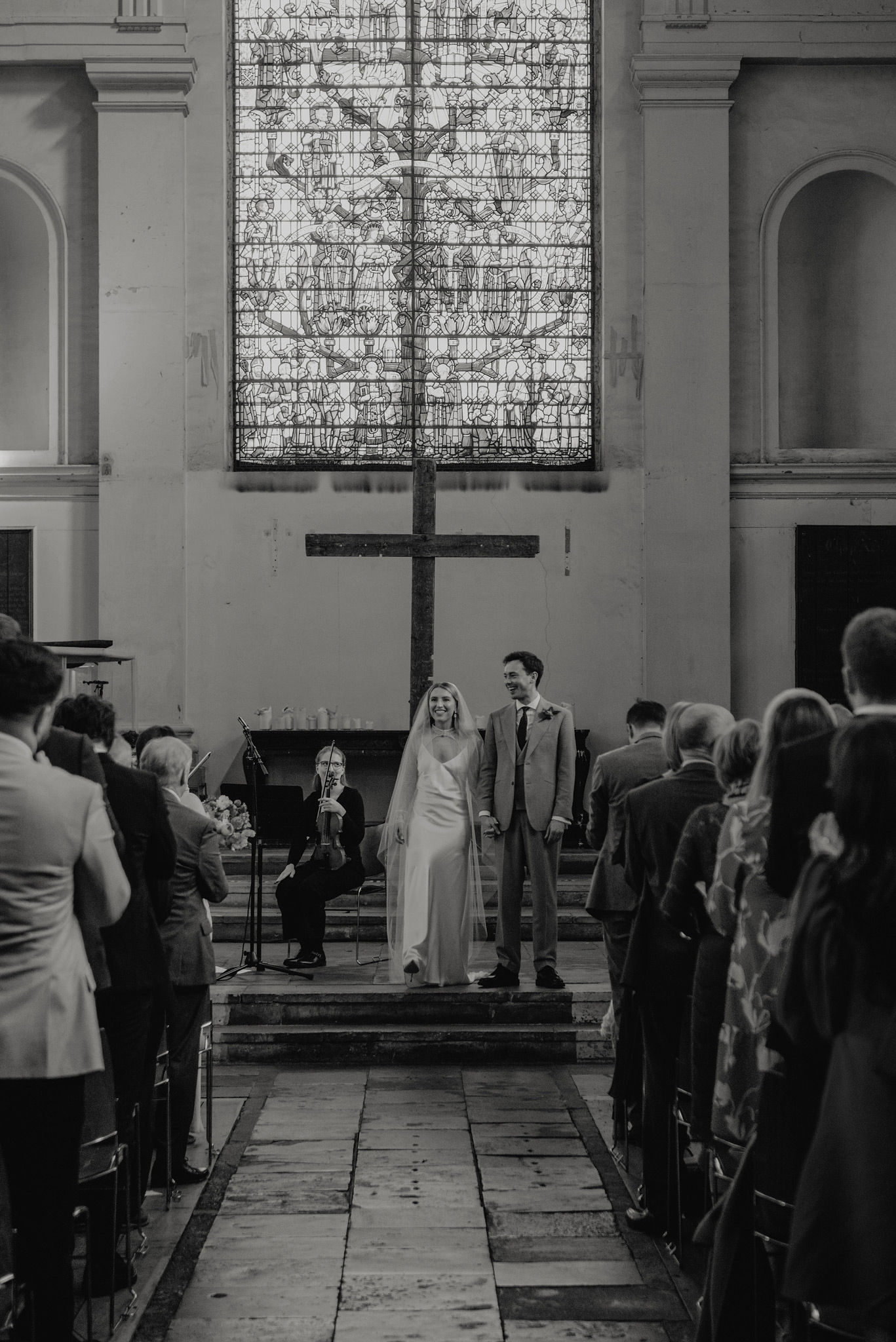 bride and groom walking aisle after wedding service at shoreditch church