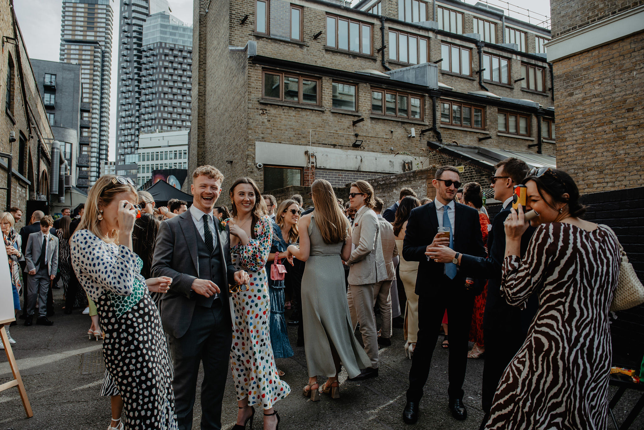 modern urban wedding reception with colour pop at shoreditch studios hackney