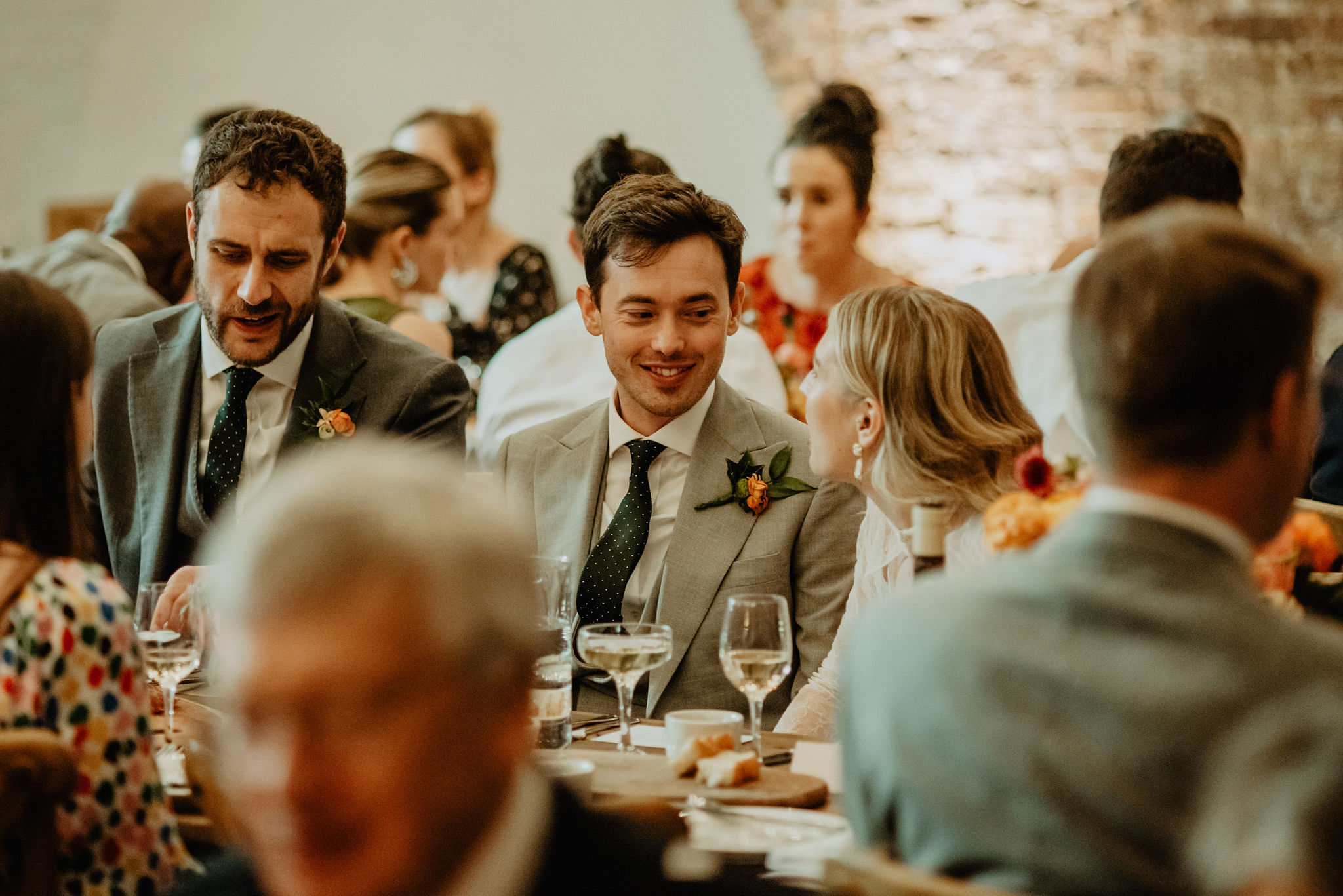 bride and groom chatting during reception at shoreditch studios wedding photography