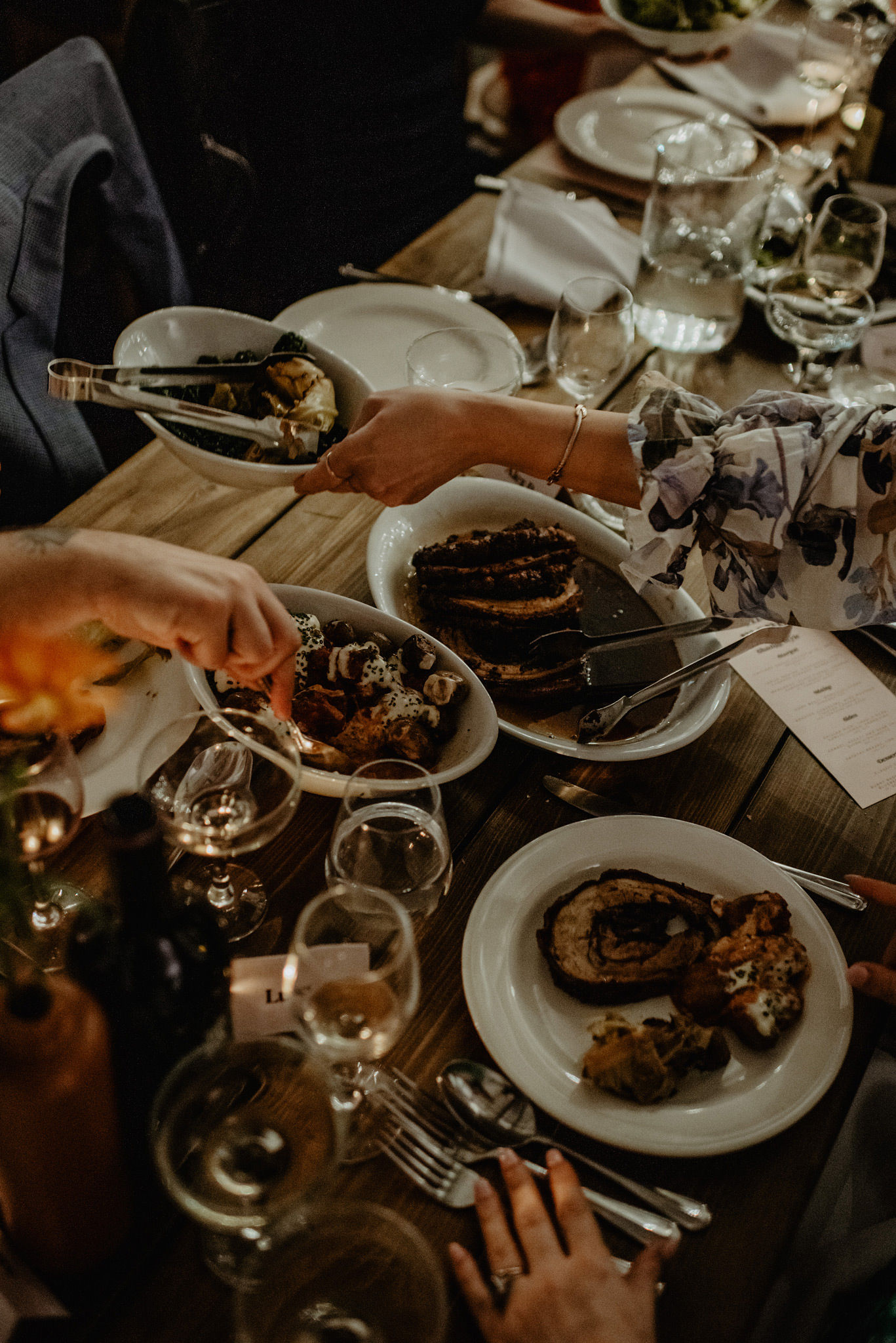 family style wedding dinner at reception at shoreditch studios 